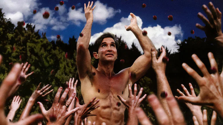 A surreal animated sequence showing cult members peeling back human skin to reveal alien forms beneath, a darkly comedic reenactment of Heaven’s Gate’s beliefs.