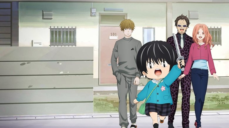 Kotaro stands in his dimly lit apartment, the light casting long shadows across the worn floor