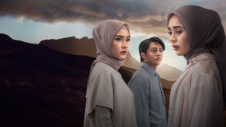 A close-up of Niyala and Faiq standing at the edge of a lush, green valley, their faces bathed in golden light as they stare into the distance.