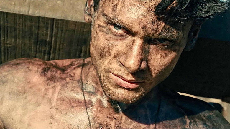 The raft scene in *Unbroken*, with the vast, empty ocean stretching endlessly around the three men