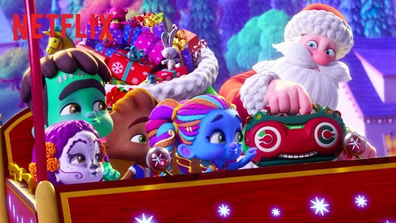 The Super Monsters huddle around Santa's workbench, their tiny hands glowing as they levitate presents into perfectly wrapped boxes.
