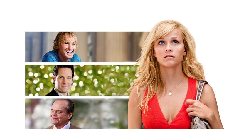 A moment of quiet tension between Reese Witherspoon and Paul Rudd, their faces half-lit by soft, diffused light.