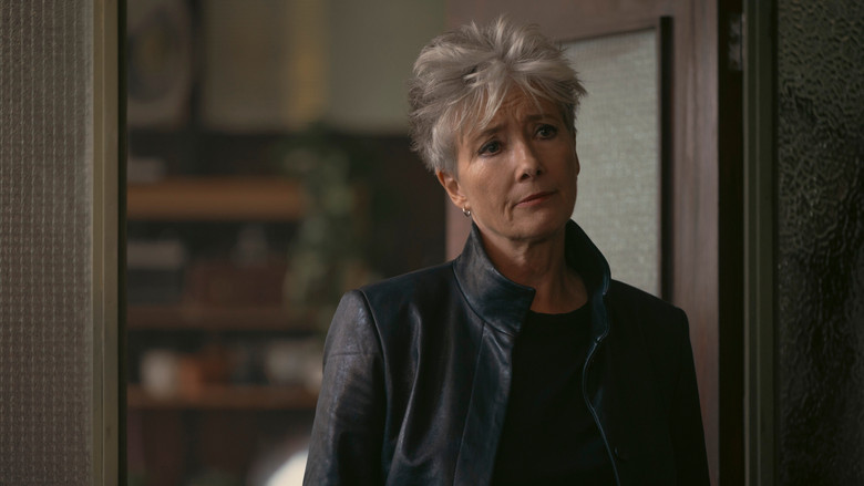 A shadowy military figure overlooking the suburban wreckage