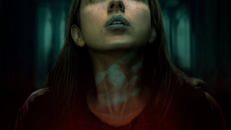 A dimly lit hallway stretches into darkness, the walls lined with peeling wallpaper and flickering lightbulbs
