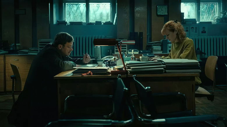A dimly lit interrogation room, the air thick with tension as two men sit across from each other, one older and weary, the other young and defiant.