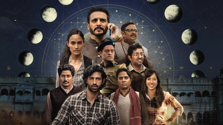 A dimly lit room where the ensemble cast huddles around a table, their faces half-shadowed, as they pore over blueprints and astrological charts.