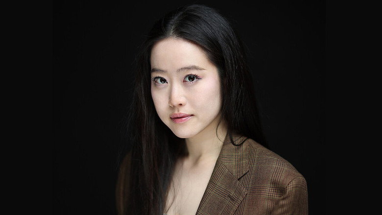 Stephanie Soo's face half-lit in shadow, suggesting a tone of intimacy and unease
