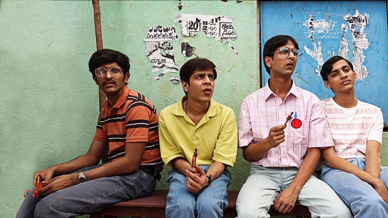 A dimly lit room where three young men sit in awkward silence, their faces half-lit by the glow of a single lamp