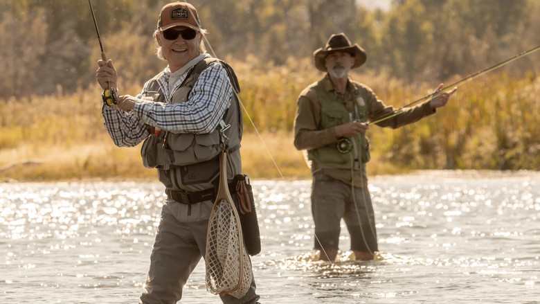 Michelle Pfeiffer looking out a window, her face partially obscured by the reflection of the landscape
