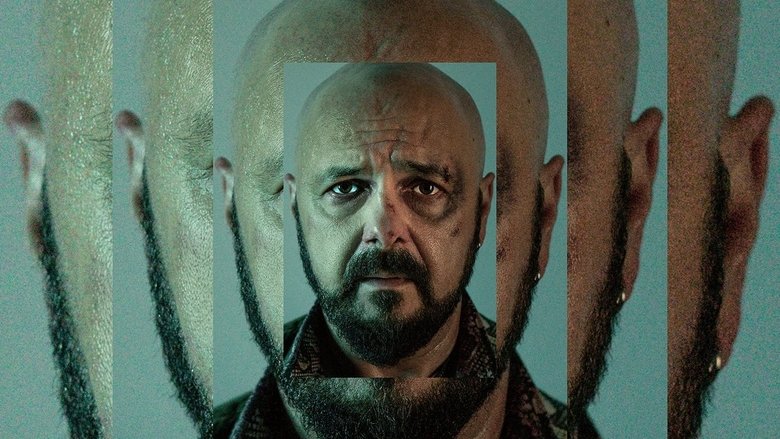 A close-up of Marcin Kania, his face half-lit by the glow of a neon sign, his expression caught between defiance and despair.