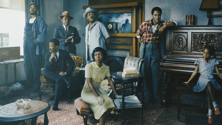 The piano, bathed in golden light, sits in the center of the Charles family’s Pittsburgh home, its carved faces of enslaved ancestors staring out like silent judges.