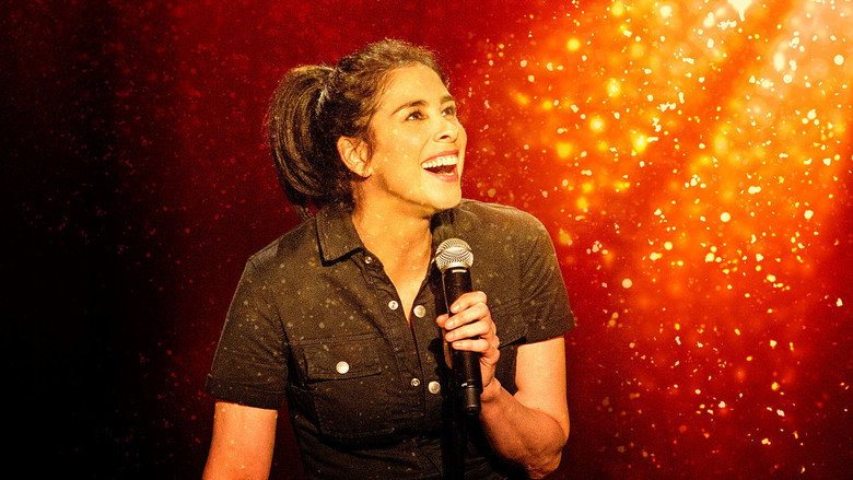Silverman on stage, mid-gesture, her face lit with that signature mix of mischief and melancholy