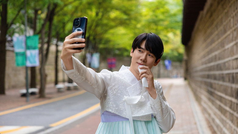 The blurred silhouette of a spirit hovering near the desk