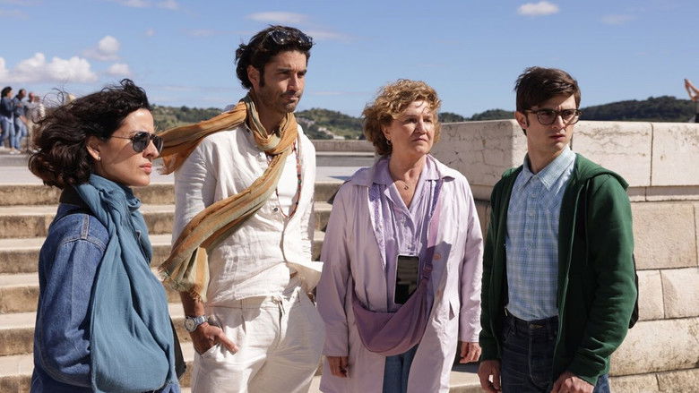 The tour group looking visibly distressed in a hotel lobby